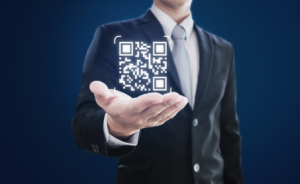 man holding qr code